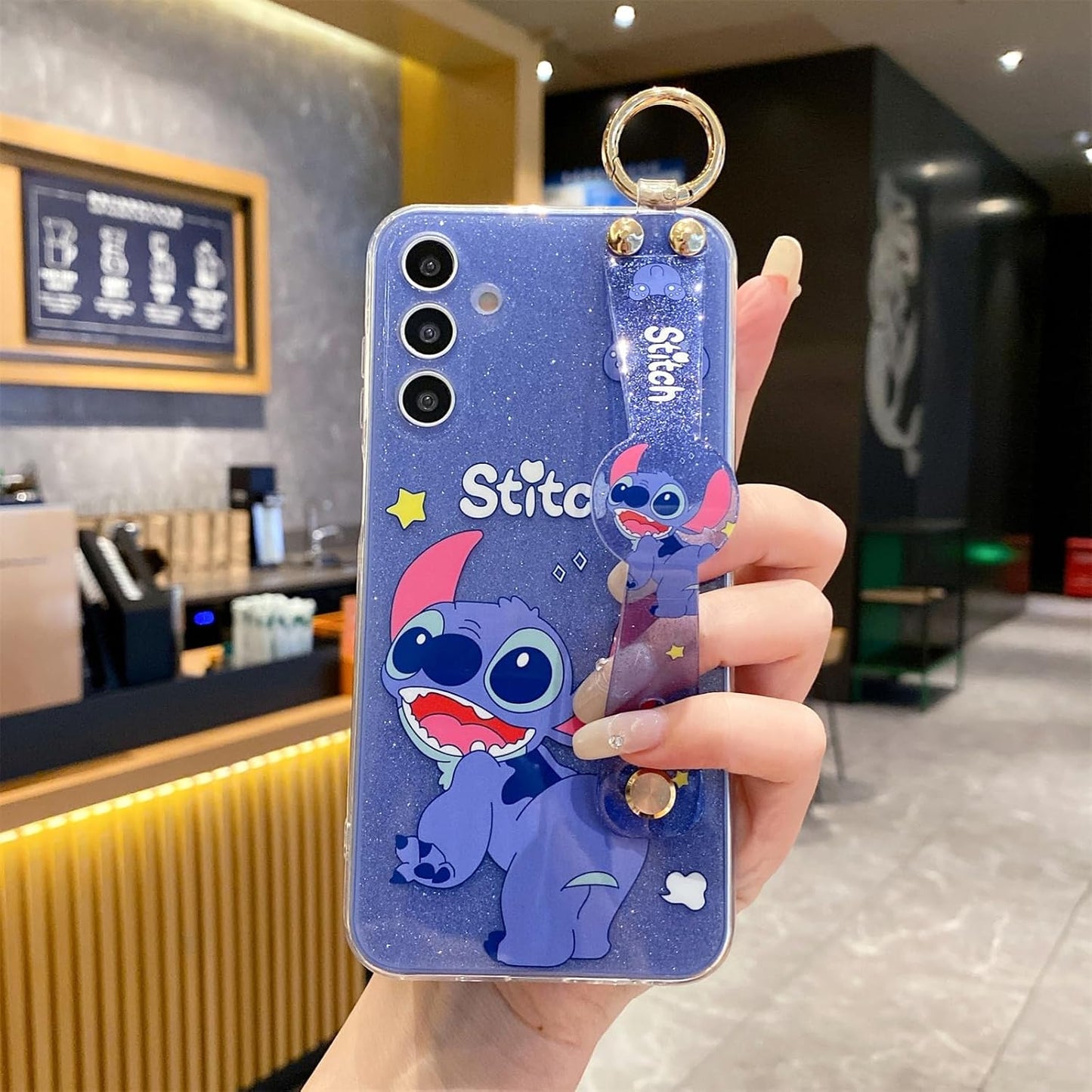 for Samsung Galaxy A16 5G Case with Wrist Strap Kickstand Cute Glitter Cartoon Camera Lens Protector Shockproof Protective Cover for Women Girls (Stit 1)